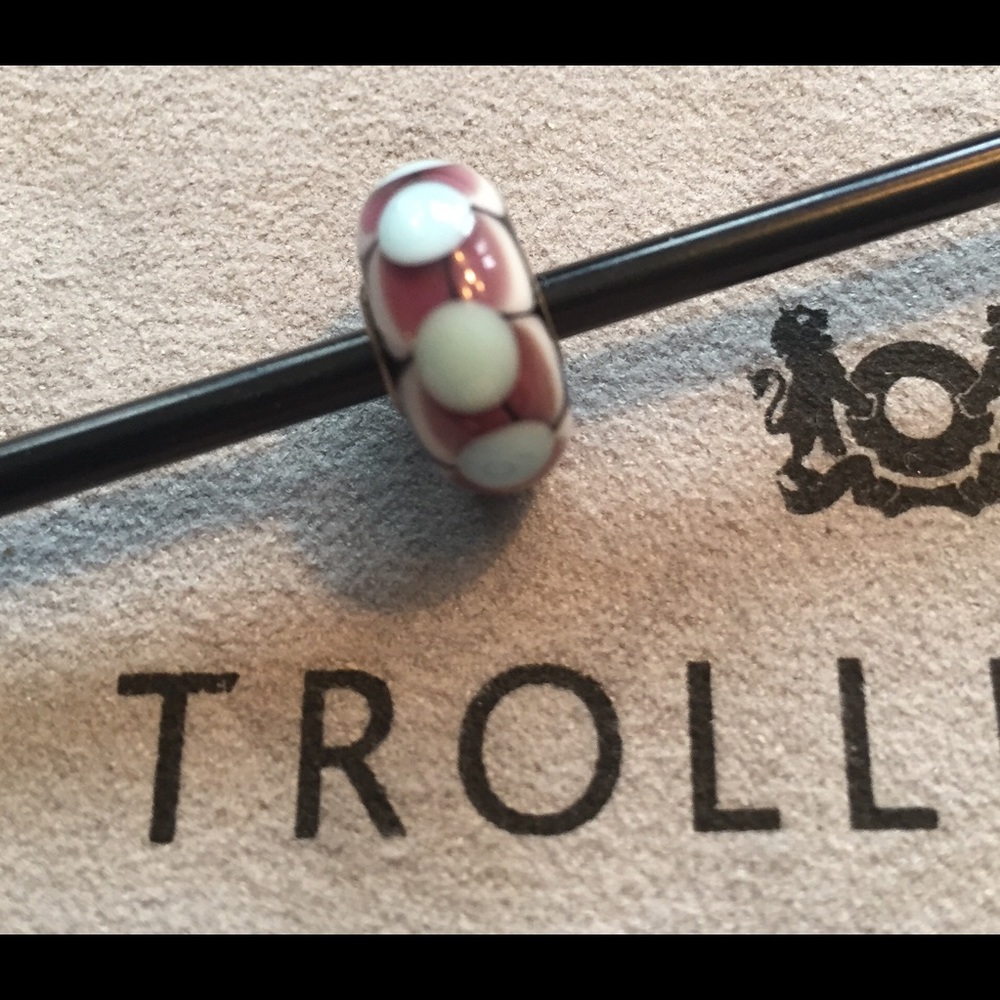 Trollbeads “Dolly” glass bead with silver core.